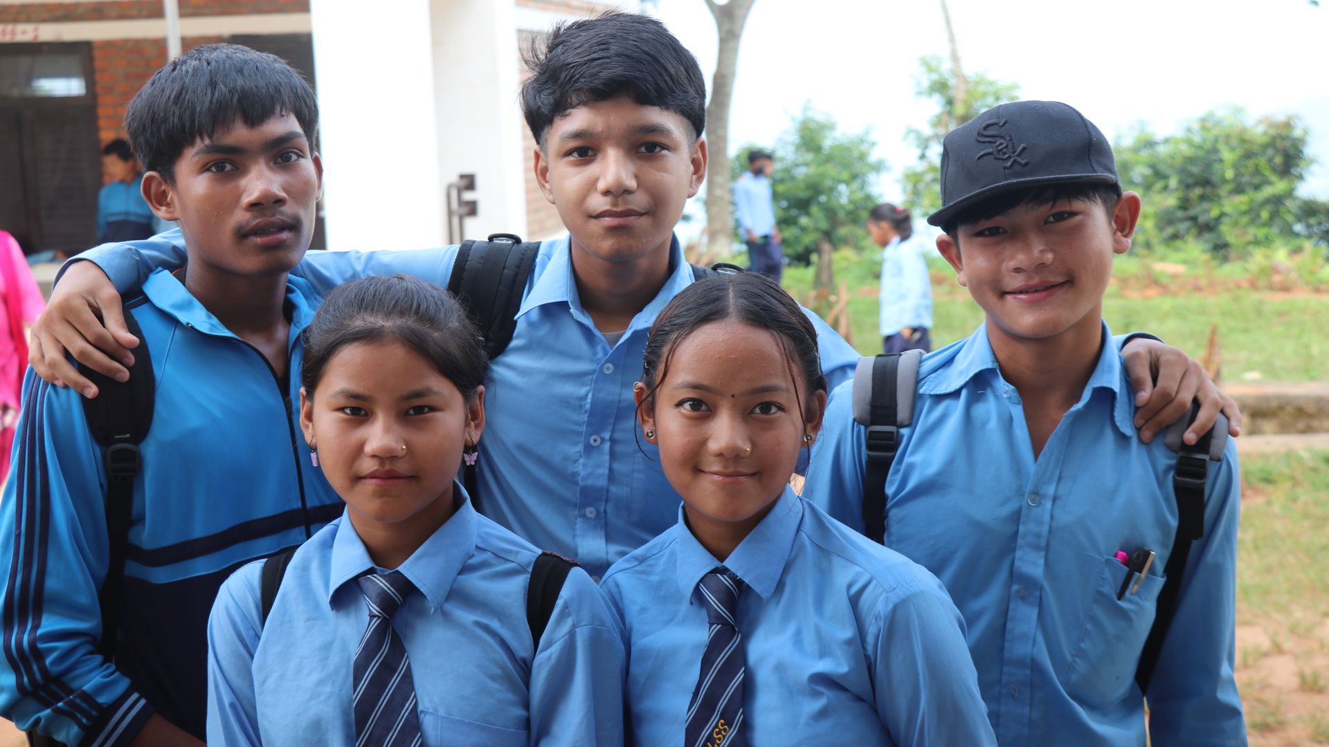Smiling schoolchildren in uniform